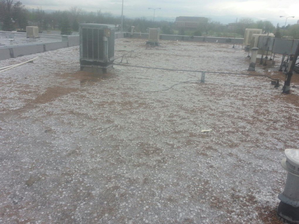 Commercial roof covered in hail